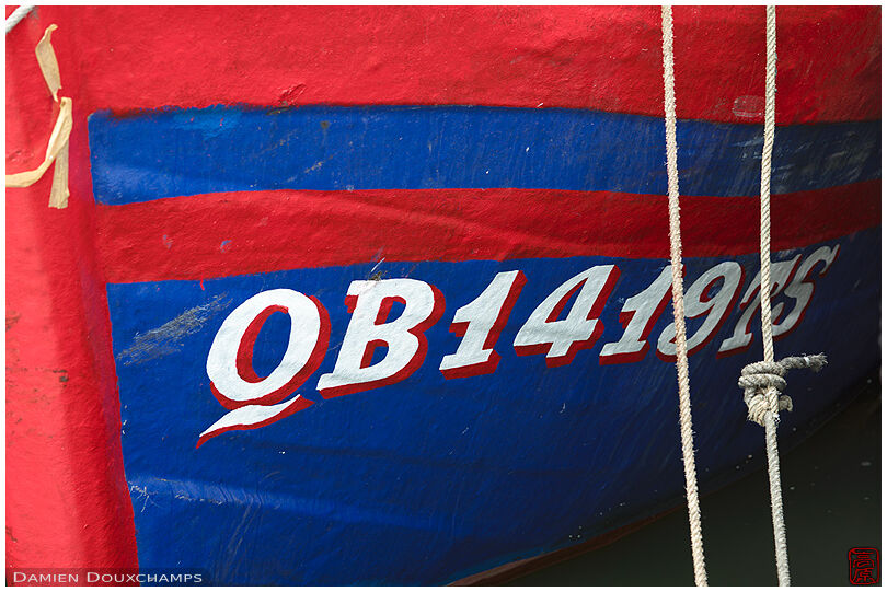 The painted bow of a fishing vessel, Dong Hoi harbour, Viet Nam