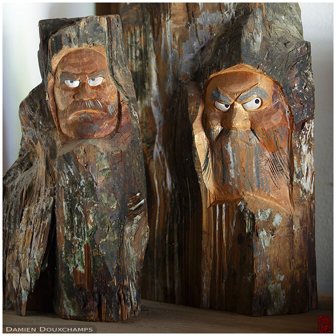 Daruma statues hewed from old wood stump, Daio-in temple, Kyoto, Japan