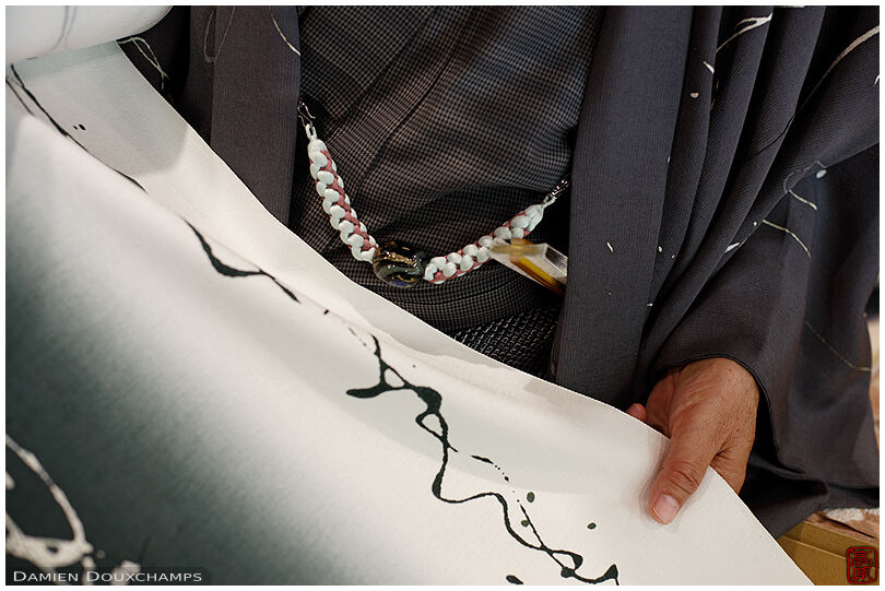 Kimono designer showing his work, Kyoto, Japan