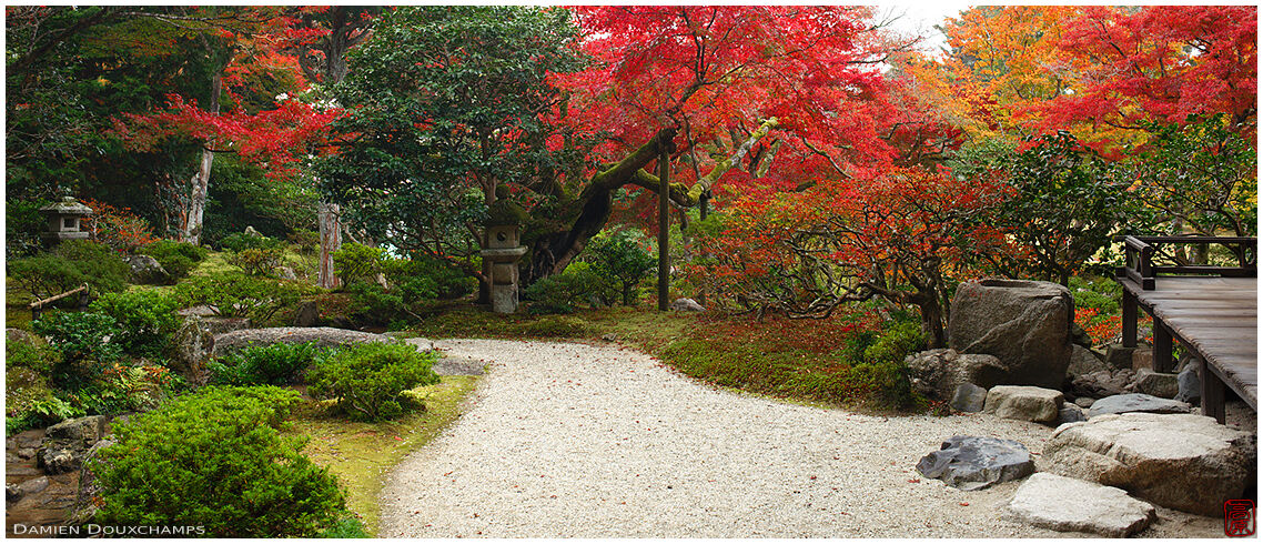 Two lanterns and a tsukubai in a small garden of the Shugaku-in imperial villa, Kyoto, Japan