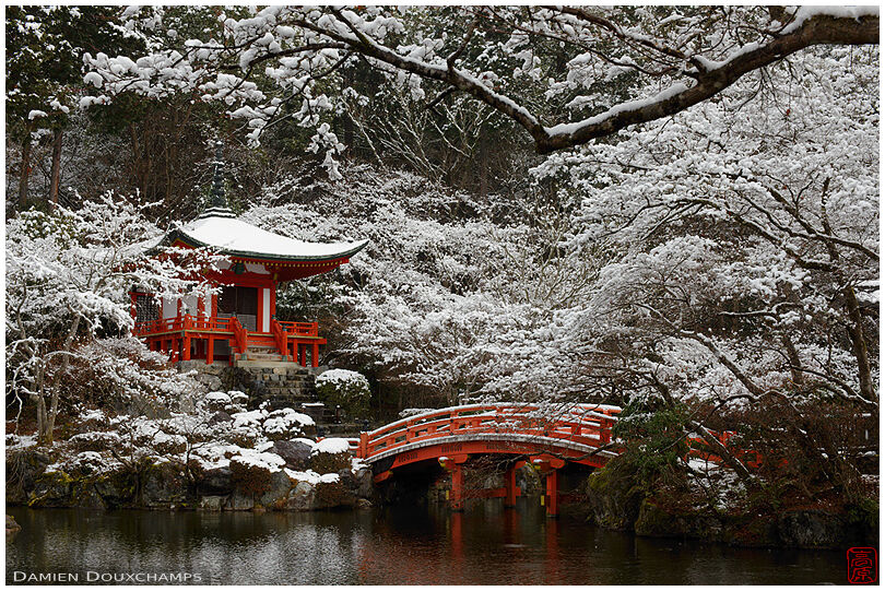 The Daigo-ji temple Bentendo hall and its red bridge in winter, Kyoto, Japan