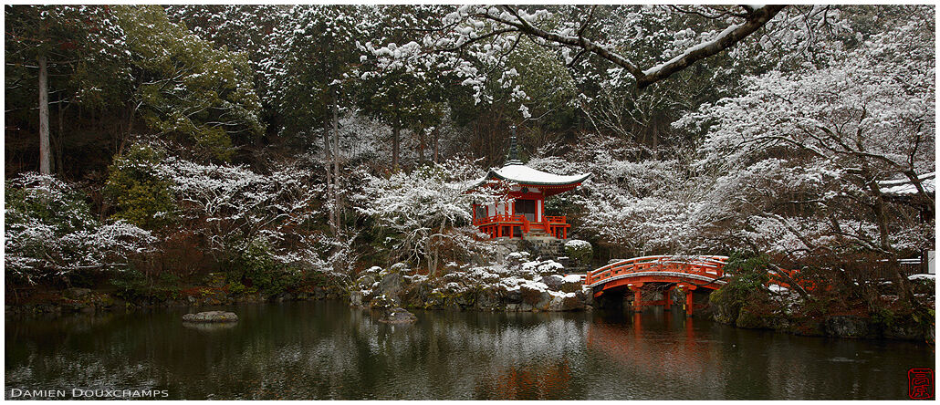 Light snow over Daigo-ji temple Bentendo pavilion and its pond, Kyoto, Japan