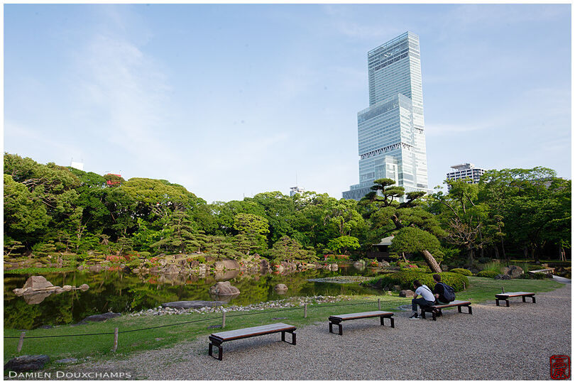 Keitakuen garden and the Harukas tower, Osaka, Japan