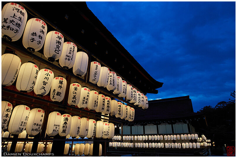 Multitude of paper lanterns during blue hour in Shimogamo shrine, Kyoto, Japan