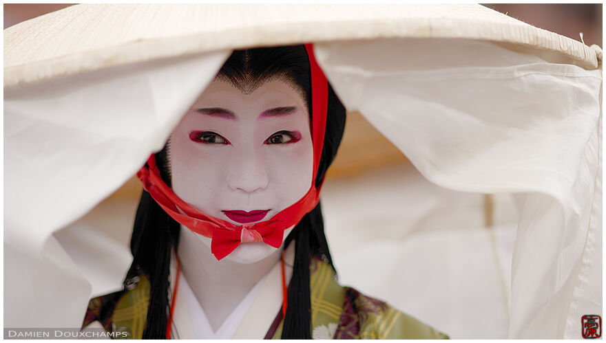Perfect smile for a member of the Fujiwara family as depicted during the Jidai festival in Kyoto, Japan