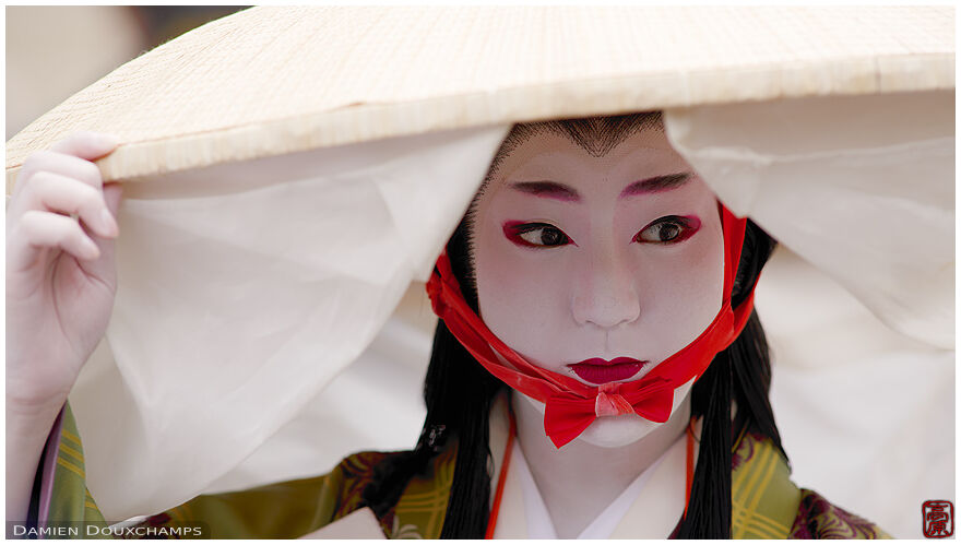 Exquisite make-up on a member of the Fujihara family, Jidai festival, Kyoto, Japan