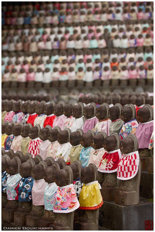 Thousands of jizo statues with bibs made from recycled kimono fabric, Gyokukei-ji temple, Shiga, Japan