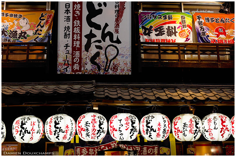 Omnipresent advertising on a restaurant of the Shinsekai district, Osaka, Japan