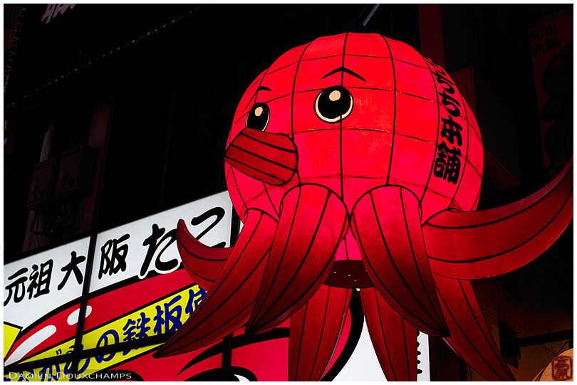 Red octopus sign of a takoyaki restaurant in Osaka, Japan