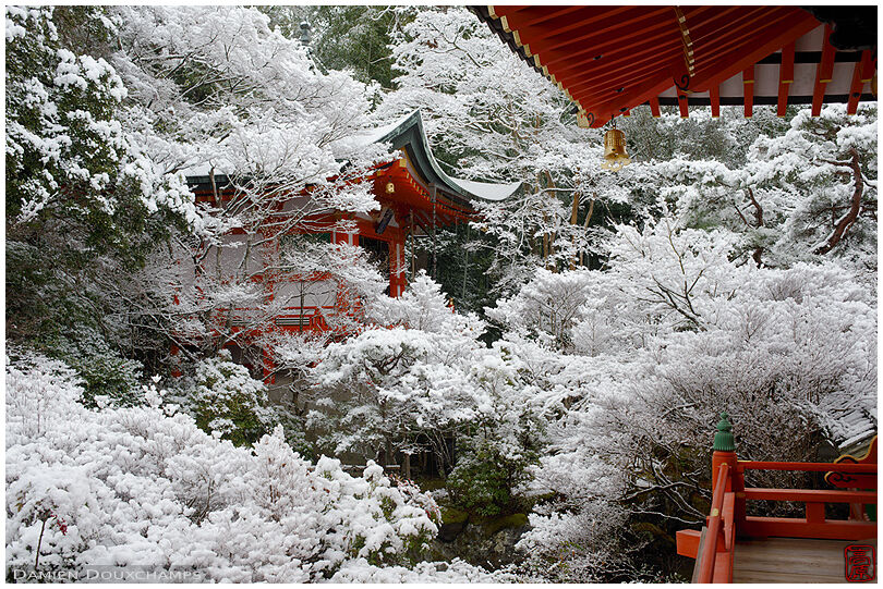 Red architecture in white snow, Bishamon-do temple, Kyoto, Japan