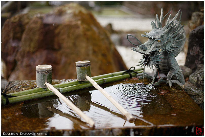 Wash basin with dragon fountain in Yoko-ji temple, Kyoto, Japan