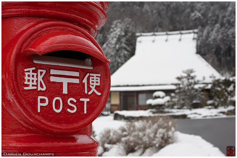 Old-style post collection box in the snowy northern village of Miyama, Kyoto, Japan