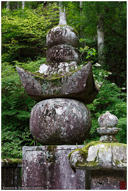 Massive old grave representing the five elements: earth, water, air, fire and space, Okunoin forest cemetery, Koyasan, Japan