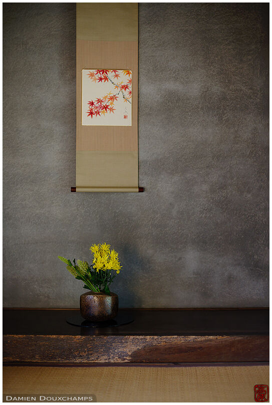 Seasonal flowers and scroll in a tokonoma alcove of the Iwakura hermitage, Kyoto, Japan