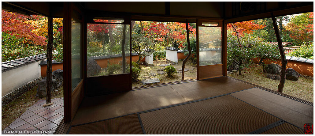 Tea house surrounded by autumn foliage, Shodensanso, Kyoto, Japan