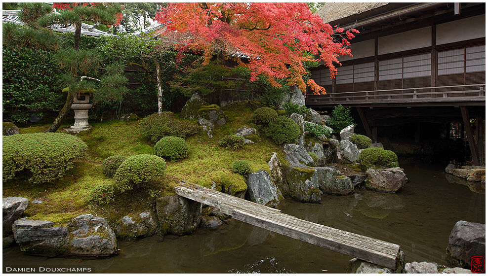 Delicate stone bridge over pond, Sanpo-in temple, Kyoto, Japan