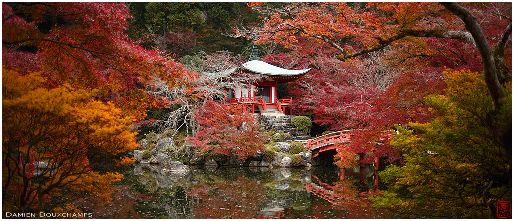 The Bentendo hall and pond of Daigo-ji temple lost in autumn colors, Kyoto, Japan