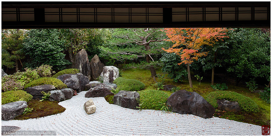 Tranquil dry landscape garden with a touch of autumn foliage, Reigen-in temple, Kyoto, Japan
