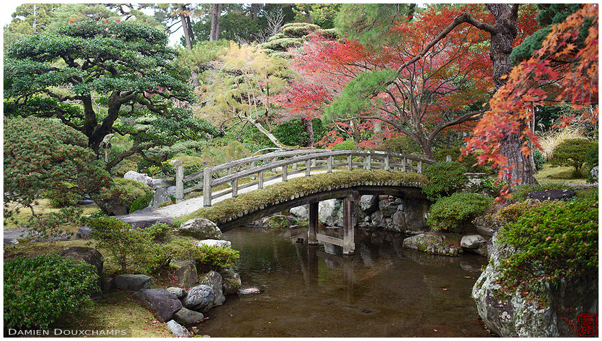 Wooden bridge in the Imperial Palace gardens, Kyoto, Japan