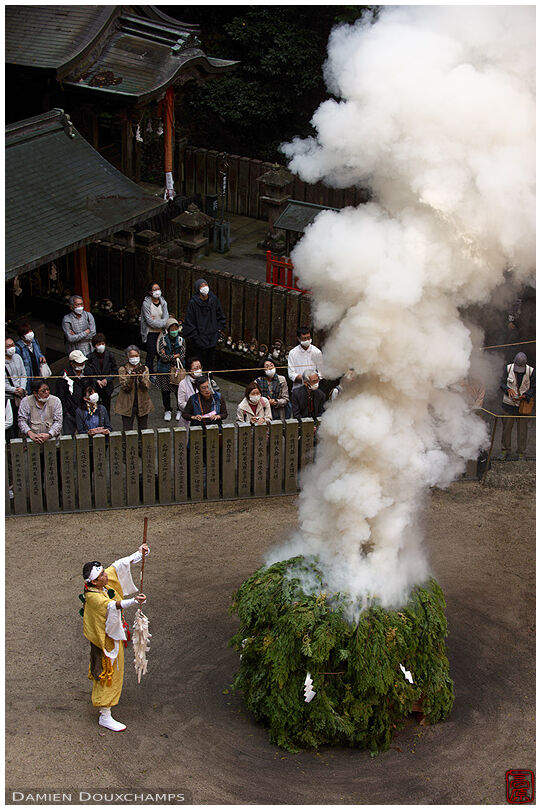 Fire starting during the annual festival in Tanukidanisan Fudoin temple, Kyoto, Japan