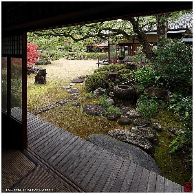 Stepping stones and tsukubai water basin in the Shodensanso garden, Kyoto, Japan