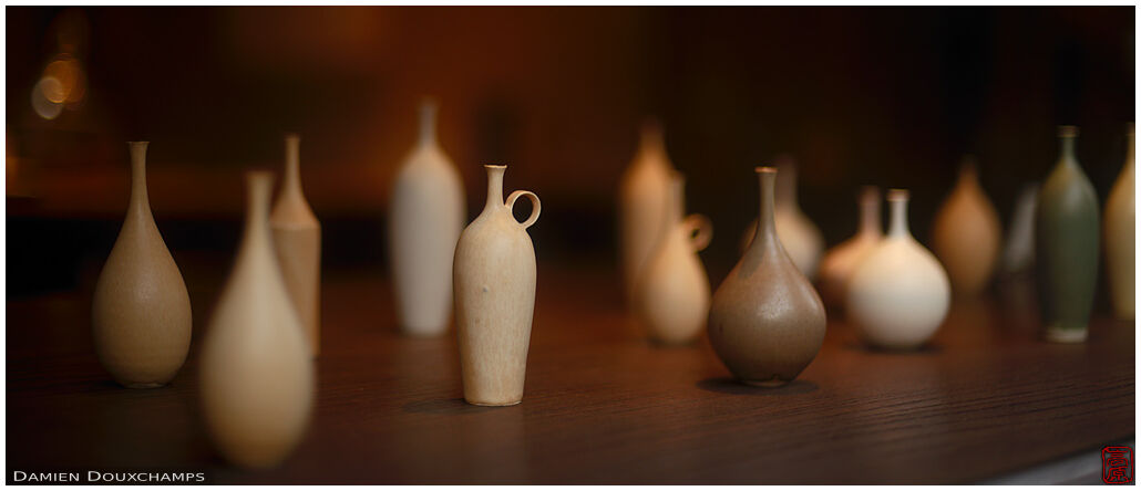 Think-necked sake bottles in a store of Gion, Kyoto, Japan