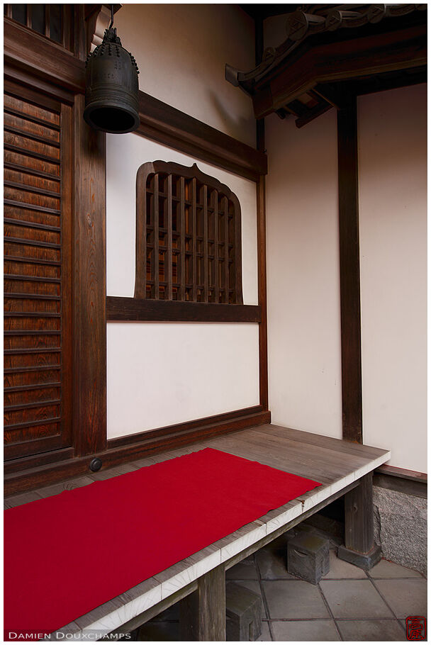 Bellflower-shaped window and red carpet in a corner of Engaku-ji temple, Kamakura, Japan