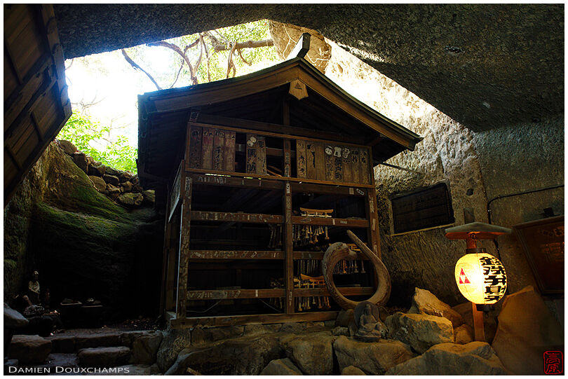 Small shrine in the caves of the Zeniarai Benzaiten, Kamakura, Japan