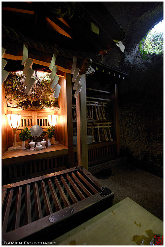 Small altar in cave, Zeniarai Benzaiten shrine, Kamakura, Japan