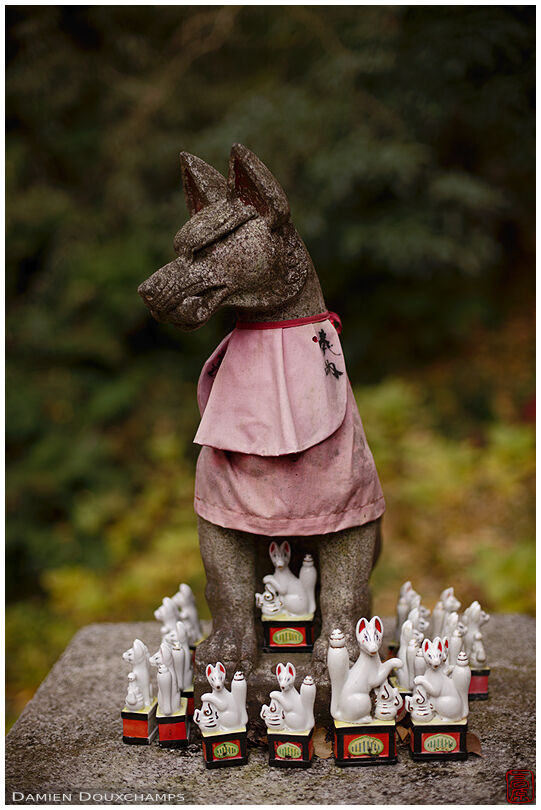 Fox statue and votive offerings, Sasuke Inari Jinja, Kamakura, Japan