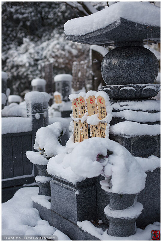 Snow-covered tombstone, Saiun-in temple, Kyoto, Japan