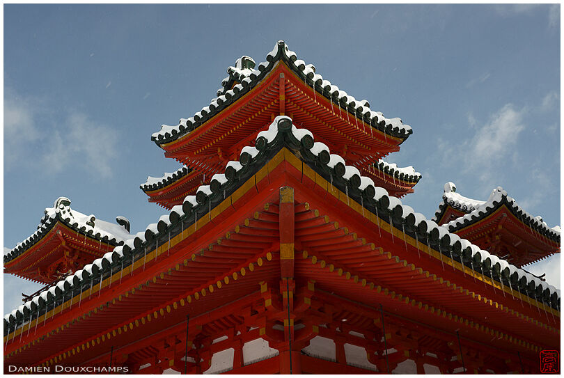 Thin snow cover on the elaborate roof lines of Heian-jingu, Kyoto, Japan