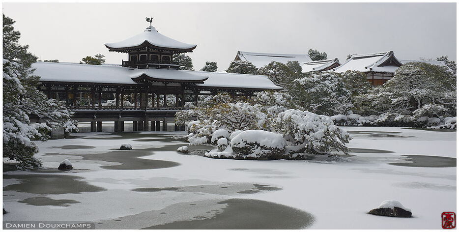 The frozen pond of Heian-jingu and its bridge, Kyoto, Japan