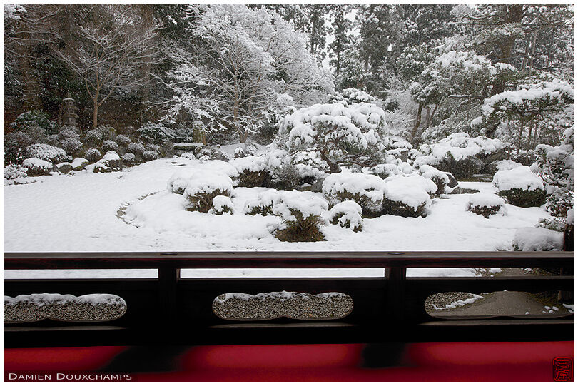 Terrace with a view on Manshuin temple snow covered garden, Kyoto, Japan