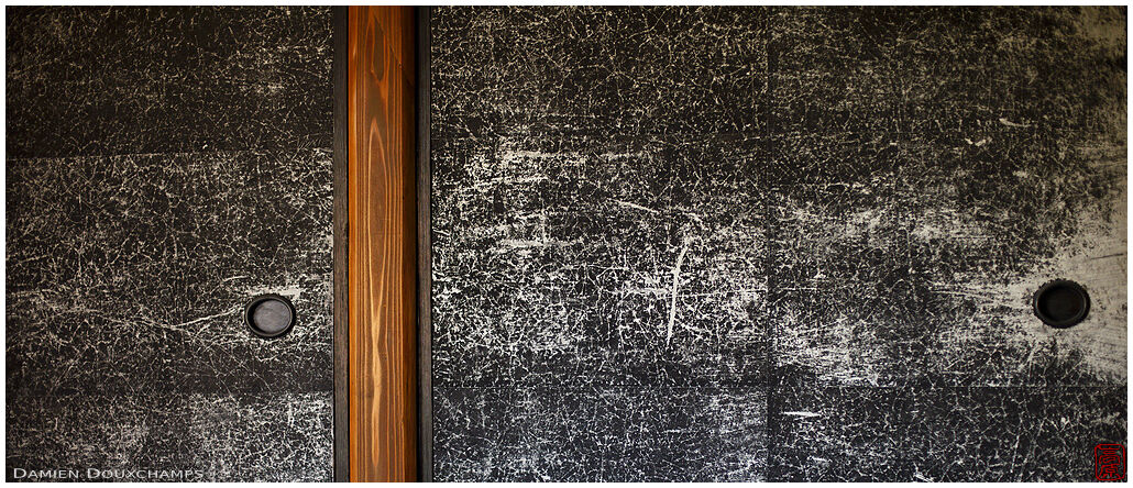Wabisabi black and white pattern on sliding doors of a tea room in Shodensanso, Kyoto, Japan