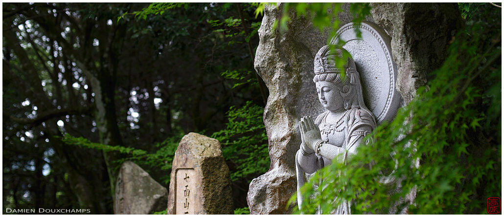 Praying statue in Shippo-ji temple, Osaka, Japan