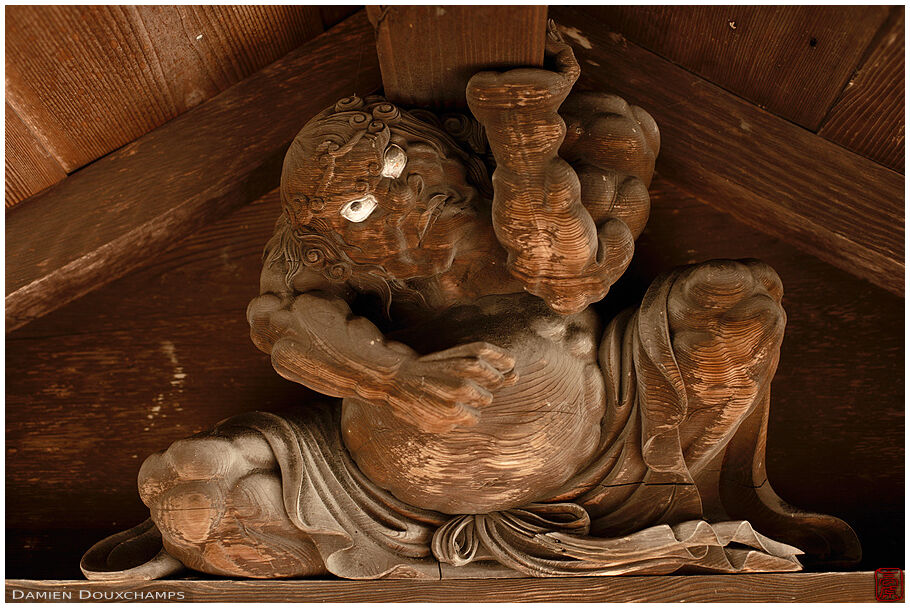 Wooden demon sculpture supporting roof, Henkoko-in, Koya-san, Japan