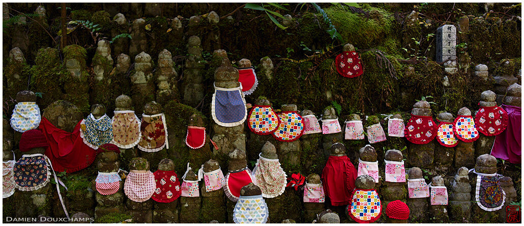 Colourful collection of jizo statues with bibs, Okunoin cemetery, Koyasan, Japan