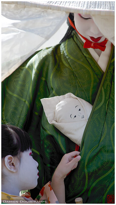 Young child and her mother, Jidai festival 2023, Kyoto, Japan