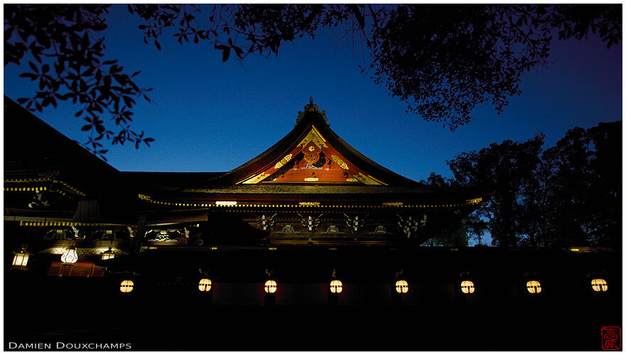 Row of lanterns during blue hour in Kitano Tenmangu srhine, Kyoto, Japan
