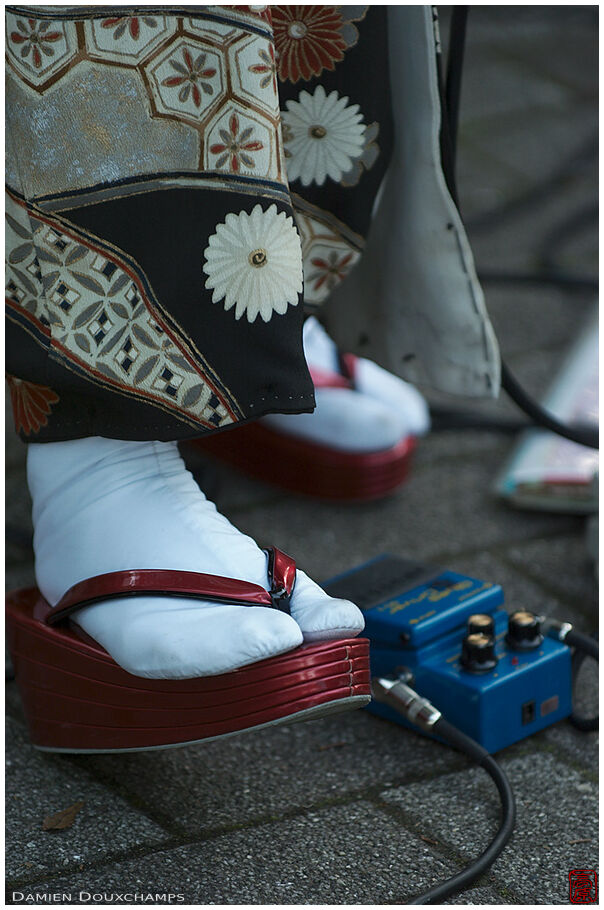 Traditional Japanese footwear with electric guitar