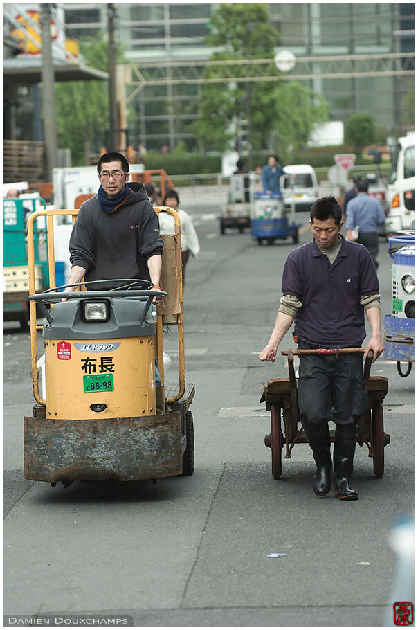 Old and new caddies at Tsukiji fish market, Tokyo