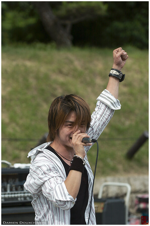 Fist in the air during a rock concert in Osakajoo koen