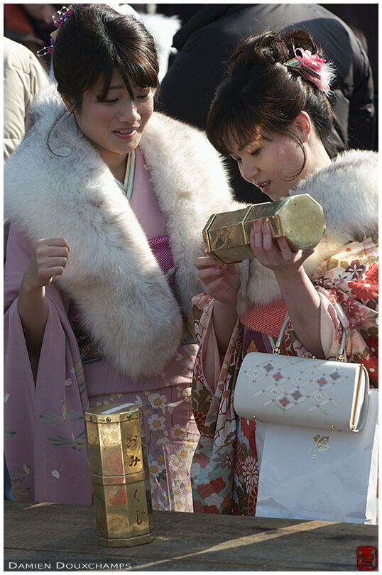 Girls in kimono hoping for a good future