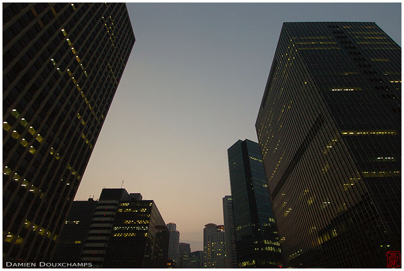Business district towers at dusk