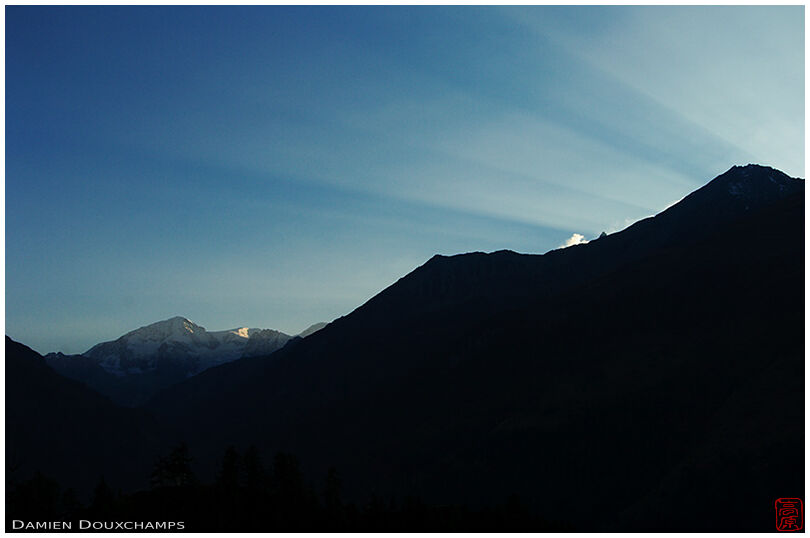 Sun beams over Mont de l'Etoile