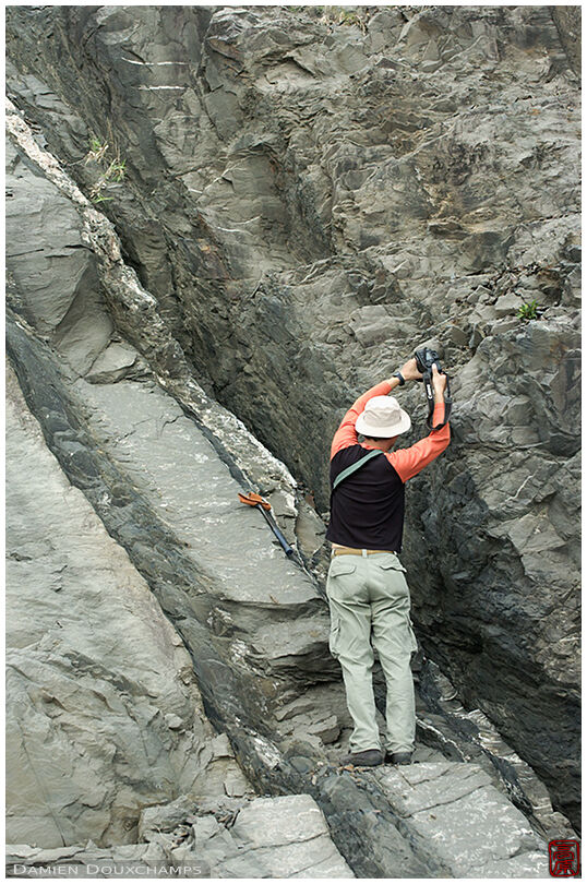 Geologist sampling rocks