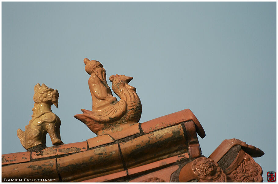 Ceramics decorating the roof of a temple