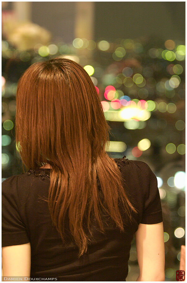 Admiring the city at night from the top of the Government Towers